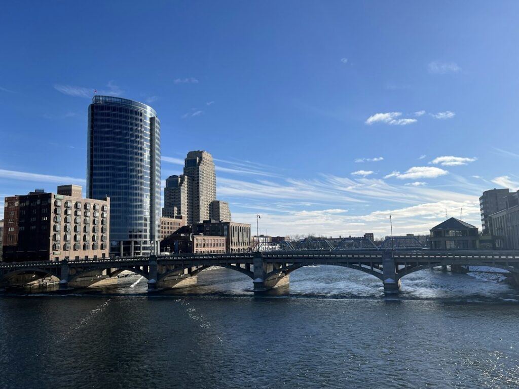 Downtown Grand Rapids, Michigan buildings viewed from a bridge over the Grand River