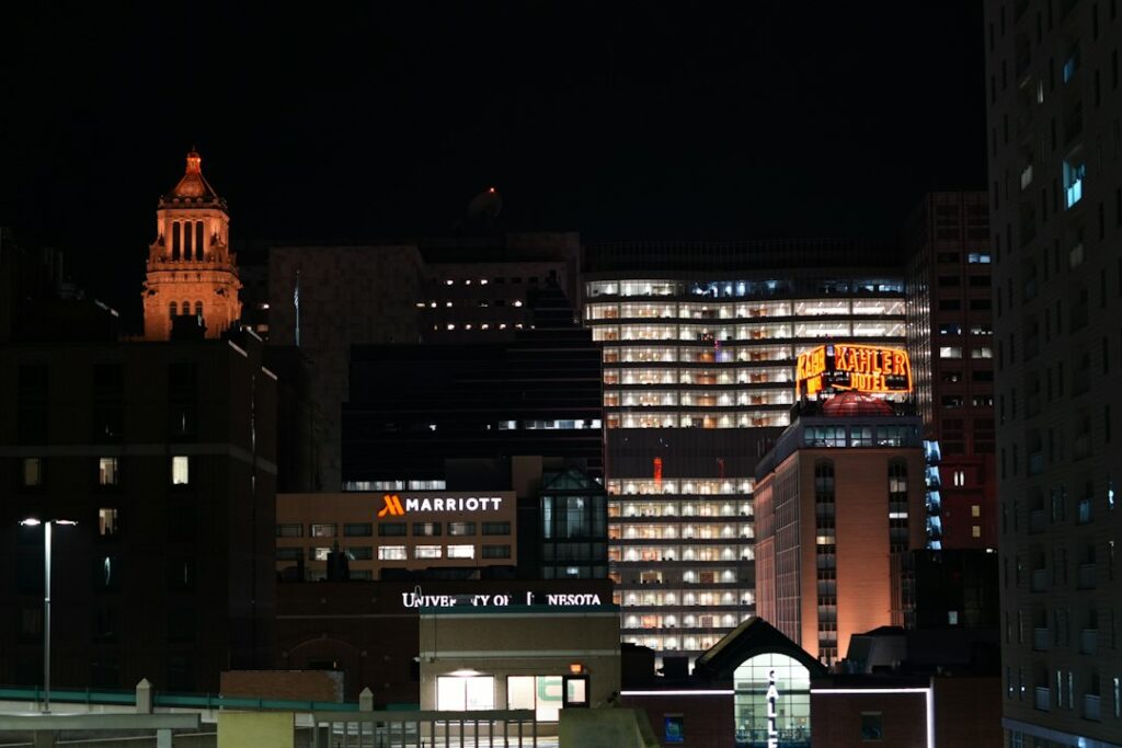 Rochester, Minnesota city buildings lit up at night under a dark sky