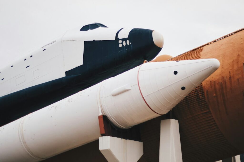 White space rocket on outdoor display, symbolizing the aerospace jobs that drive rental demand